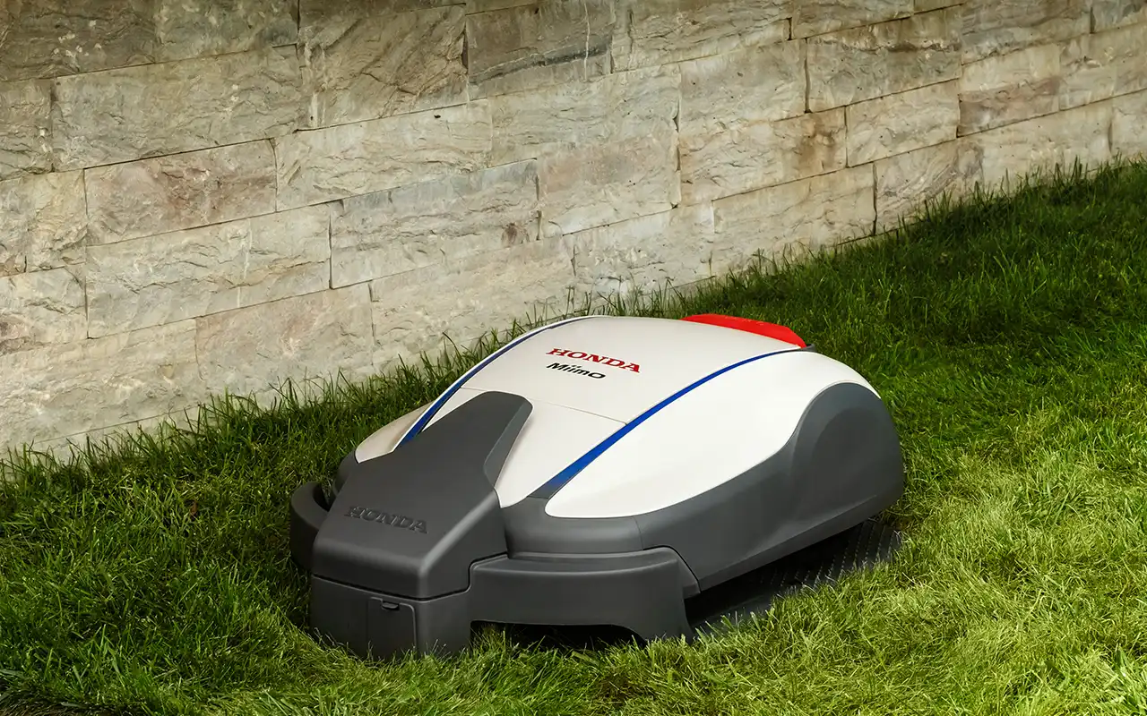 Honda Miimo HRM1000 för laddning i laddstation