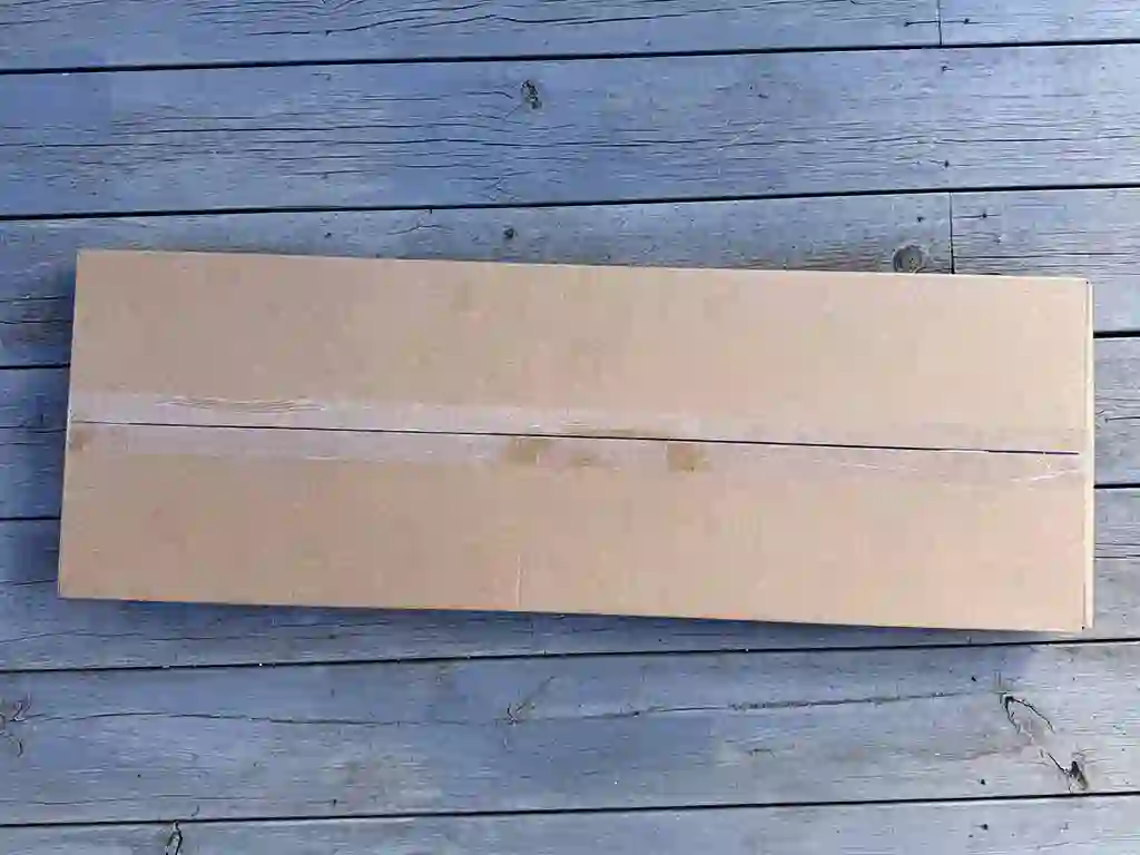 Dressraka XL med skaft från TrädgårdSmart i kartong.